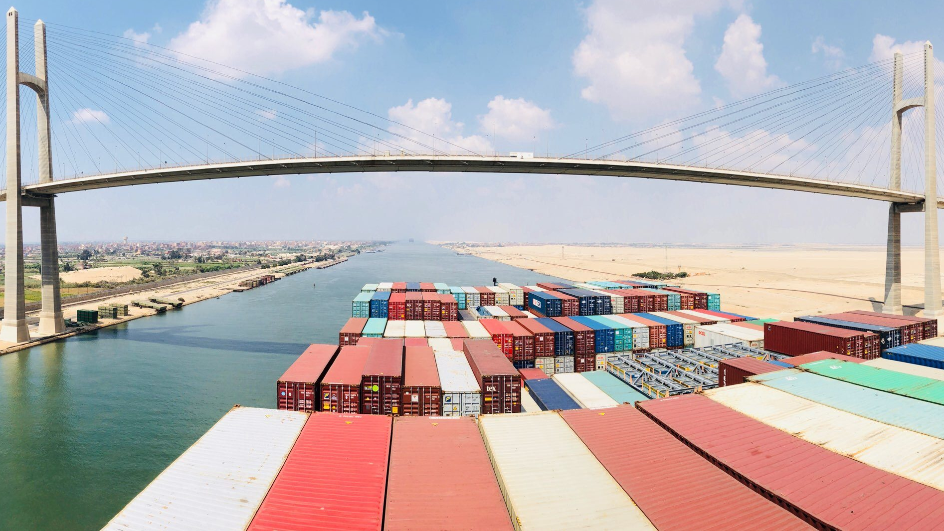 Egypt's Suez Canal tugboats working to move stranded container ship